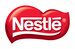 Nestlé cuts sales growth target